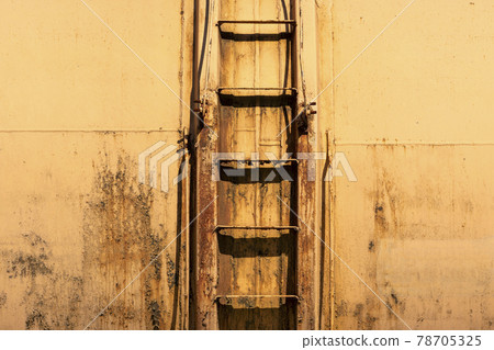 Ladder with access to a large tank 78705325