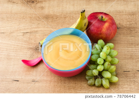 Baby food: colorful bowl of fruit puree Baby food: colorful bowl of fruit puree 78706442