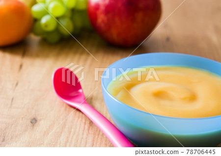 Baby food: colorful bowl of fruit puree Baby food: colorful bowl of fruit puree 78706445