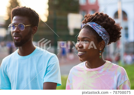 African couple walking in the city 78708075