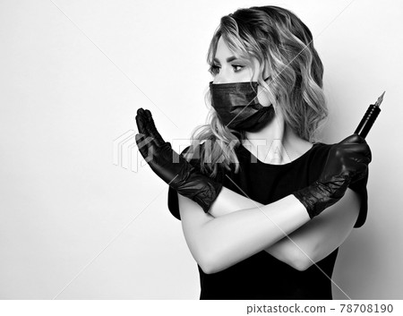 Black and white. Curly woman in protective medical Black and white. Curly woman in protective medical 78708190
