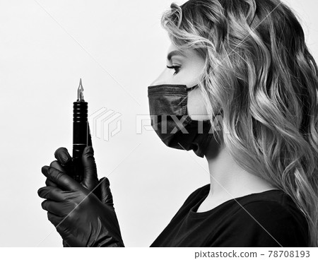 Black and white profile of curly woman in black Black and white profile of curly woman in black 78708193