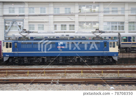 JR Freight EF65 electric locomotive that pulls a down freight train and runs near Nishi-Akeishi Station on the Sanyo Main Line JR Freight EF65 electric locomotive that pulls a down freight train and runs near Nishi-Akeishi Station on the Sanyo Main Line 78708350