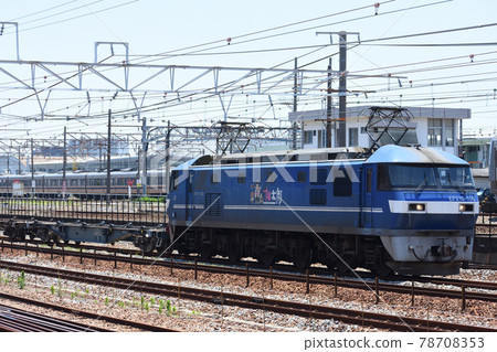 JR Freight EF210 electric locomotive that pulls a down freight train and enters a siding line near Nishi-Akeishi Station on the Sanyo Main Line 78708353