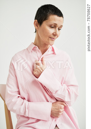 Elegant Mature Woman in Pink 78708627