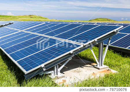 Solar cells or solar module or solar panels in solar power plant turn up skyward absorb the sunlight from the sun use light energy to generate electricity on blue sky 78710076