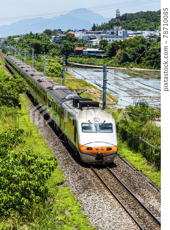 Tze-Chiang Limited Express train through the beautiful countryside of Hualien, Taiwan 78710085