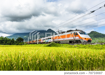 Tze-Chiang Limited Express train through the beautiful countryside of Taitung, Taiwan 78710087
