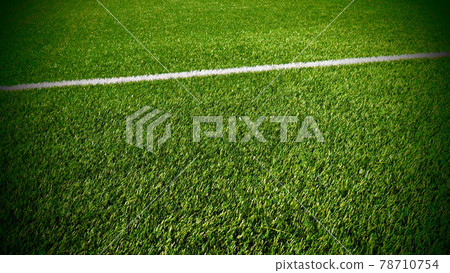 soccer field for championship.The marking of the football field on the green grass. White line. Football field area. Dark vignetting around the edges soccer field for championship.The marking of the football field on the green grass. White line. Football field area. Dark vignetting around the edges 78710754