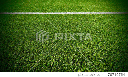 soccer field for championship.The marking of the football field on the green grass. White line. Football field area. Dark vignetting around the edges soccer field for championship.The marking of the football field on the green grass. White line. Football field area. Dark vignetting around the edges 78710764