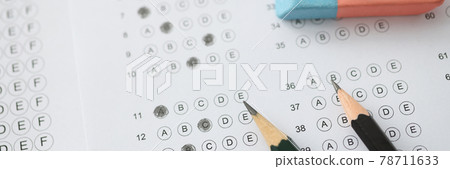 On table is test with options for answer pencils and wash On table is test with options for answer pencils and wash 78711633