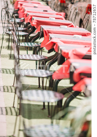 Tables with chairs at summer empty open air cafe Tables with chairs at summer empty open air cafe 78712657