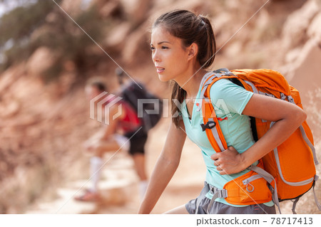 walking with heavy backpack