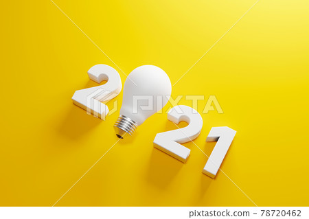Light bulb and 2021 new year on yellow background 78720462