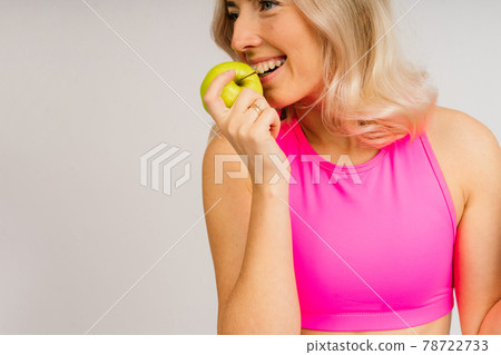 beautiful young sporty muscular woman, isolated against white background beautiful young sporty muscular woman, isolated against white background 78722733