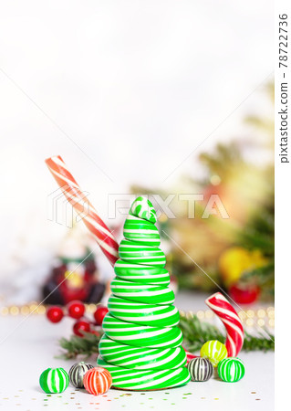 Caramel candy Christmas tree. Christmas card concept. Caramel candy Christmas tree. Christmas card concept. 78722736