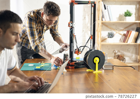 New generation of 3D Printing Machine printing a piece of plastic. For use in small spaces, Office or Private use 78726227