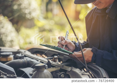 Mechanic car service auto garage in automotive mobile center. Technician workshop repair engine motor vehicles service mechanical engineering business. Automobile mechanic hands car repairs technic 78726400
