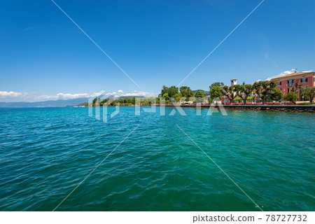 Lago di Garda - Lake Garda in front of the Small Village of Bardolino Veneto Italy Lago di Garda - Lake Garda in front of the Small Village of Bardolino Veneto Italy 78727732