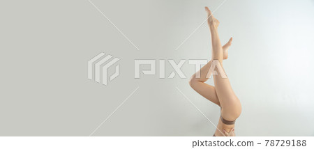 Beautiful female legs isolated on white background. Beauty, cosmetics, spa, depilation, treatment and fitness concept. Fit and sportive, sensual body with well-kept skin in underwear. Beautiful female legs isolated on white background. Beauty, cosmetics, spa, depilation, treatment and fitness concept. Fit and sportive, sensual body with well-kept skin in underwear. 78729188