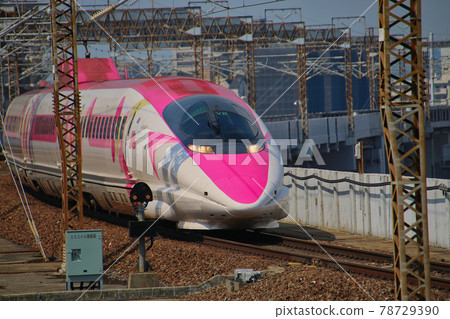 Shinkansen passing through Okayama Shinkansen passing through Okayama 78729390