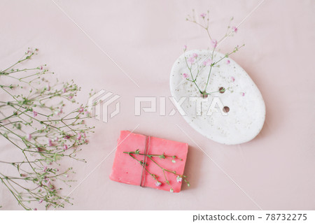 Natural handmade soap bar with ceramic soap dish and flowers, spa organic soap, sustainable lifestyle 78732275