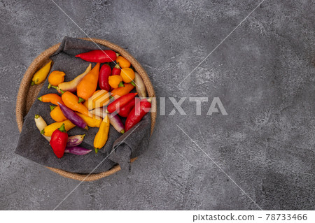 Peruvian chili peppers of various colors Peruvian chili peppers of various colors 78733466