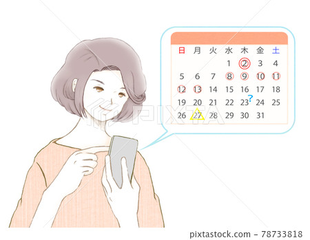 A woman checking the calendar app on her smartphone 78733818