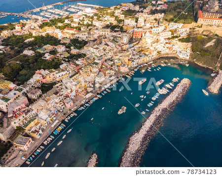 Aerial drone view of Corricella fisherman village in Procida island Naples Italy 78734123