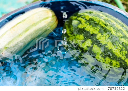 Cold watermelon and water drops in the jar Cold watermelon and water drops in the jar 78739822