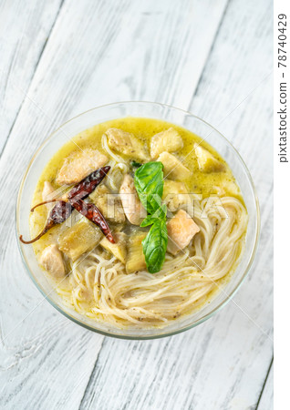 Bowl of green curry with noodles Bowl of green curry with noodles 78740429
