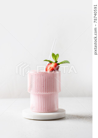 Indian strawberry lassi, smoothie or milkshake on white background 78740591