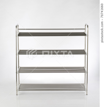 Empty stainless steel shoe racks isolated on white Empty stainless steel shoe racks isolated on white 78741660