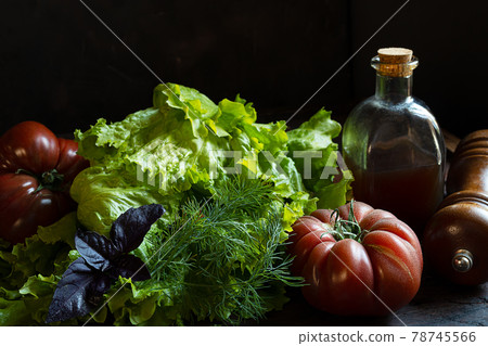 Tomatoes, salad and pumkins oil Tomatoes, salad and pumkins oil 78745566