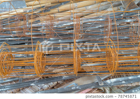 Close up of metal stainless rusted steel wire lines on site. Product in construction site. Raw material background. 78745871