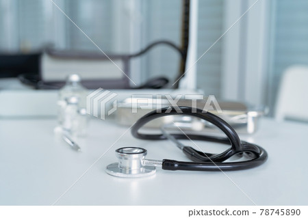 Stethoscope on table, doctor equipment in clinic or hospital. Medical and healthcare instruments 78745890