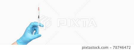 Person in blue glove hold vaccine bottle syringe. Injection pharmacy concept 78746472