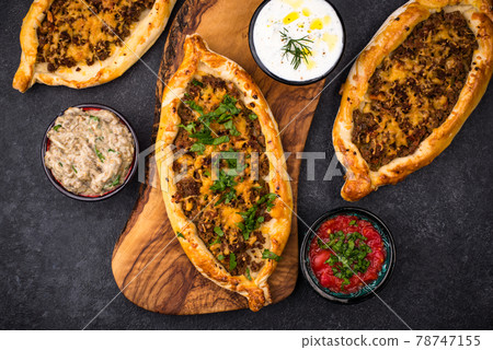 Traditional Turkish pide with meat Traditional Turkish pide with meat 78747155
