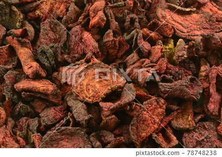 Closeup food background and texture of organic red beet chips 78748238