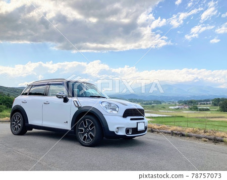 Blue sky, countryside and Mini Cooper 78757073
