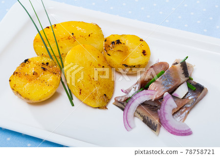 Slices of pickled herring 78758721