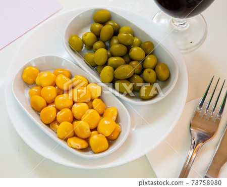 Delicious spanish tapas from olives and pickled beans Delicious spanish tapas from olives and pickled beans 78758980
