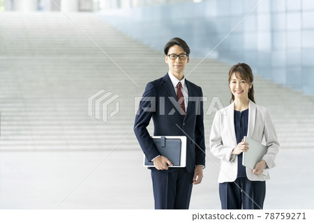 Business person male and female portrait 78759271