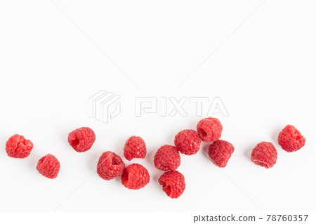 Fresh raspberries background top view. White background with raspberry berries. Fresh raspberries background top view. White background with raspberry berries. 78760357