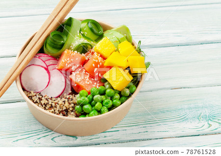 Poke bowl with salmon, cucumber and mango 78761528
