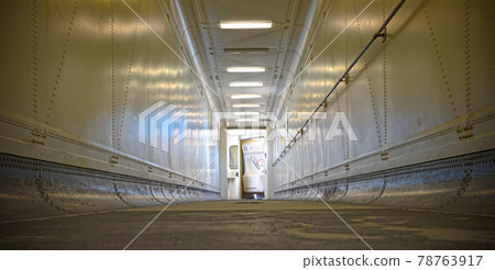 View through door into empty narrow airbridge View through door into empty narrow airbridge 78763917