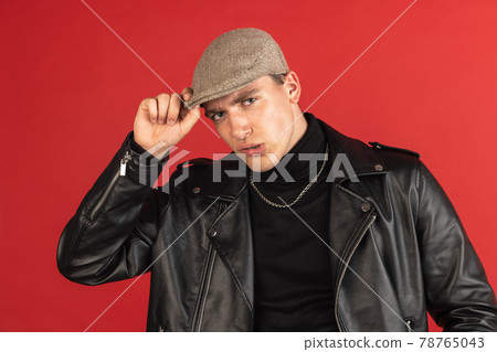 Young male portrait isolated on studio background with copyspace for ad. Young male portrait isolated on studio background with copyspace for ad. 78765043