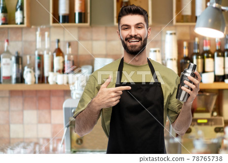 happy barman with shaker preparing 78765738