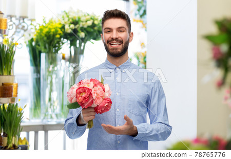 happy smiling man with bunch of flowers happy smiling man with bunch of flowers 78765776