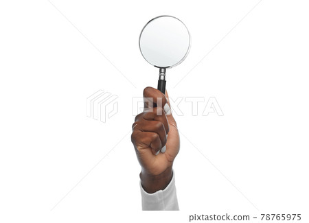 hand with magnifying glass hand with magnifying glass 78765975